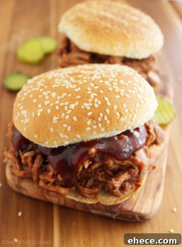 3-Ingredient Root Beer BBQ Pulled Pork – This mouthwatering, tender pulled pork is perfection on a bun. The perfect weeknight and party food! | thecomfortofcooking.com