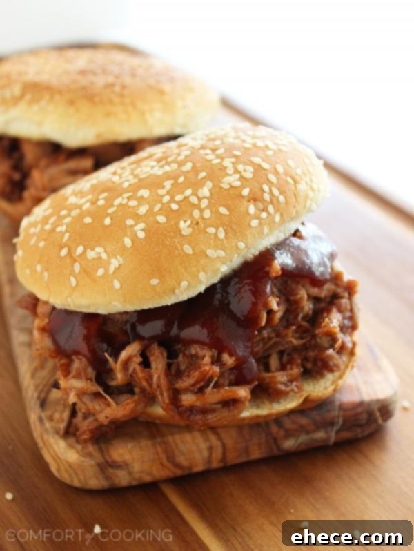 3-Ingredient Root Beer BBQ Pulled Pork – This mouthwatering, tender pulled pork is perfection on a bun. The perfect weeknight and party food! | thecomfortofcooking.com