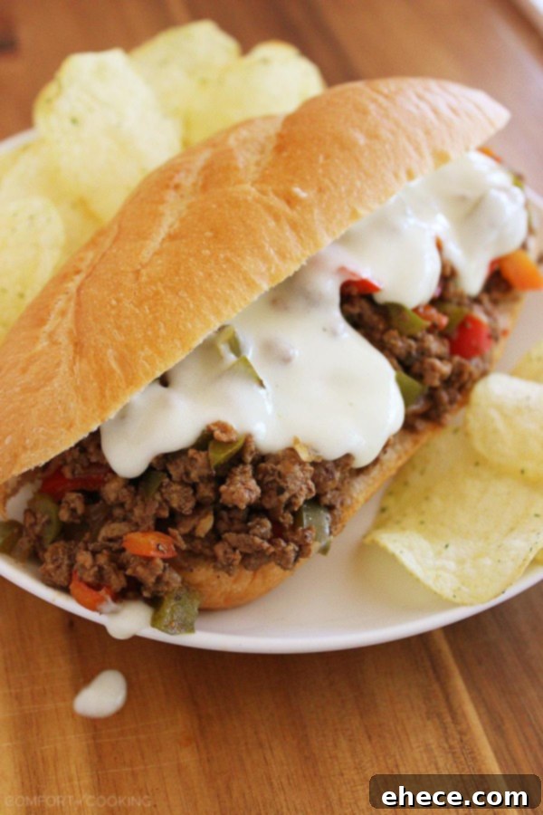 Philly Cheesesteak Sloppy Joes – Try this fun twist on Philly cheesesteaks with bell peppers and a homemade provolone cheese sauce!