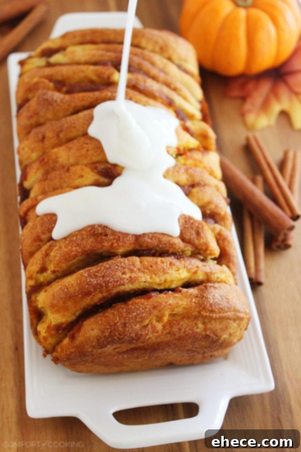 Warm Pumpkin Spice Pull-Apart Delight with Vanilla Glaze 5 Overhead shot of Pumpkin Spice Pull Apart Bread, showing the moist interior and sweet glaze