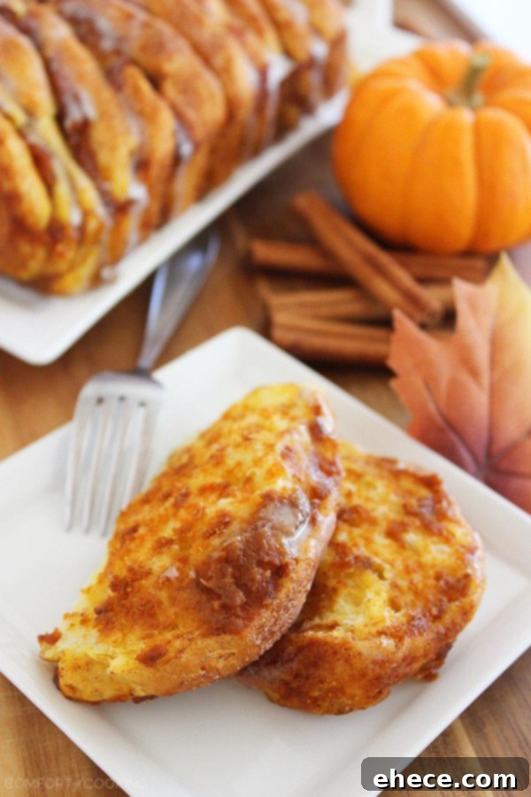 Warm Pumpkin Spice Pull-Apart Delight with Vanilla Glaze 7 Final plated view of Pumpkin Spice Pull Apart Bread with a generous drizzle of vanilla glaze