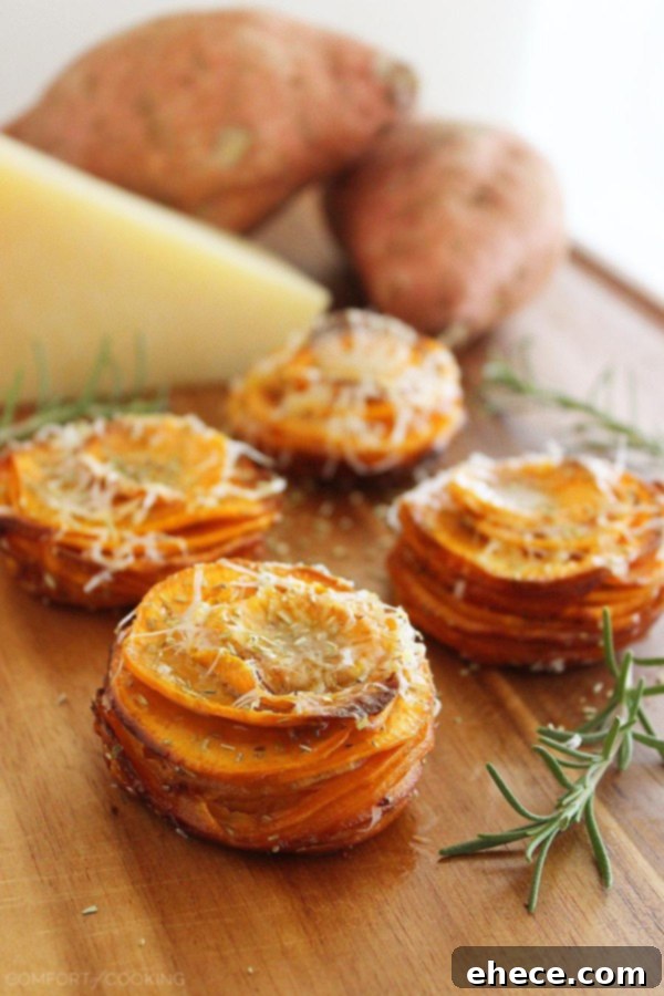 Close-up of golden-brown Crispy Parmesan-Rosemary Sweet Potato Stacks