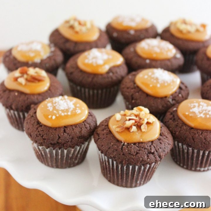 Salted Caramel Brownie Bites, garnished with sea salt and pecans.