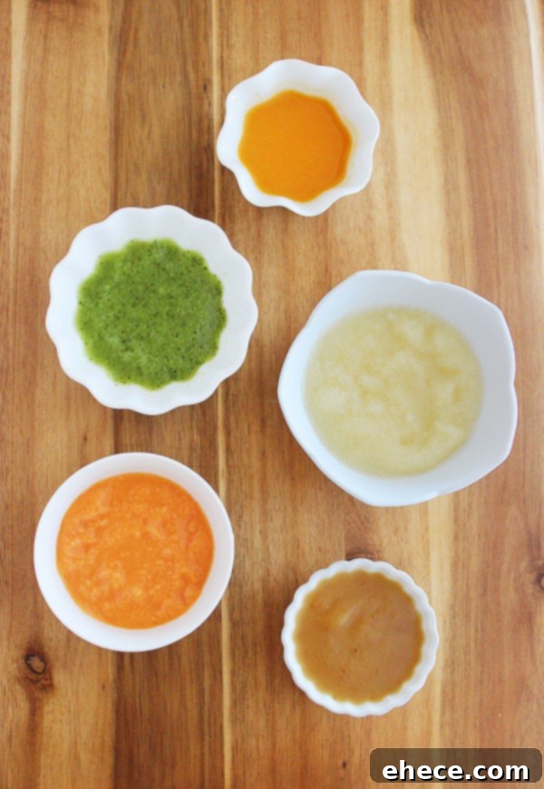 A close-up image of a baby enjoying a homemade puree from a spoon, illustrating the joy of baby-led weaning.