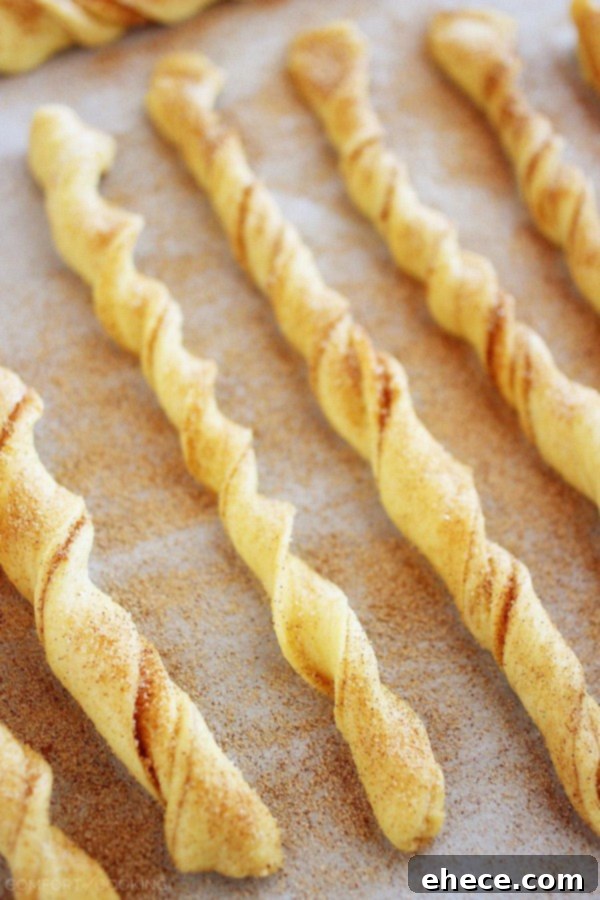 Platter of freshly baked Cinnamon Roll Twists with a delicious glaze.