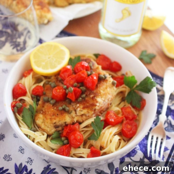 Crispy Chicken Scallopini with Tomatoes in a Lemon-Butter White Wine Sauce - A delicious and easy recipe.