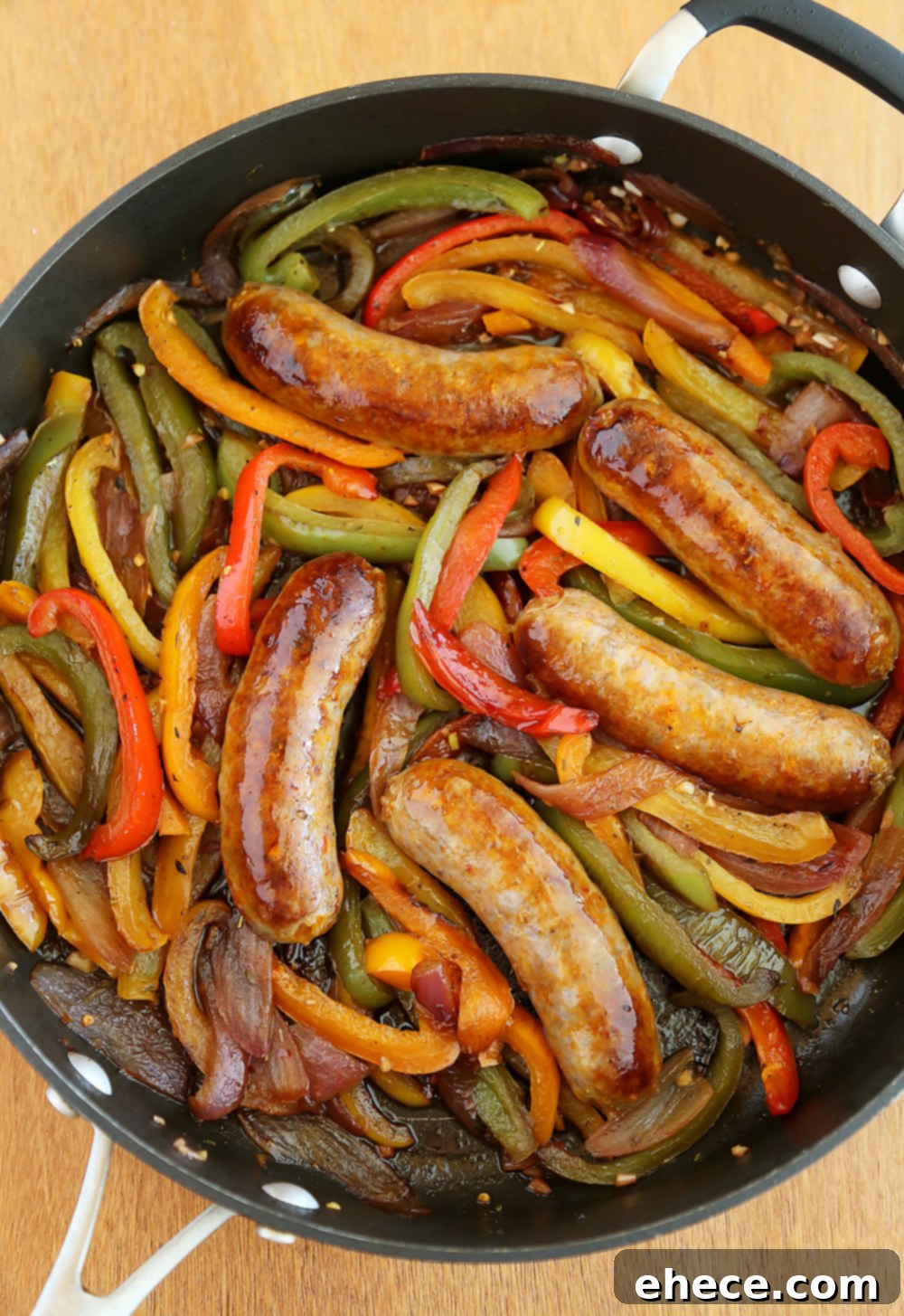 Rustic Skillet Sausage and Peppers 2 Skillet Italian Sausage, Peppers and Onions - Easy comfort food for weeknights & game days! Serve over pasta, polenta, potatoes or on warm crusty rolls.