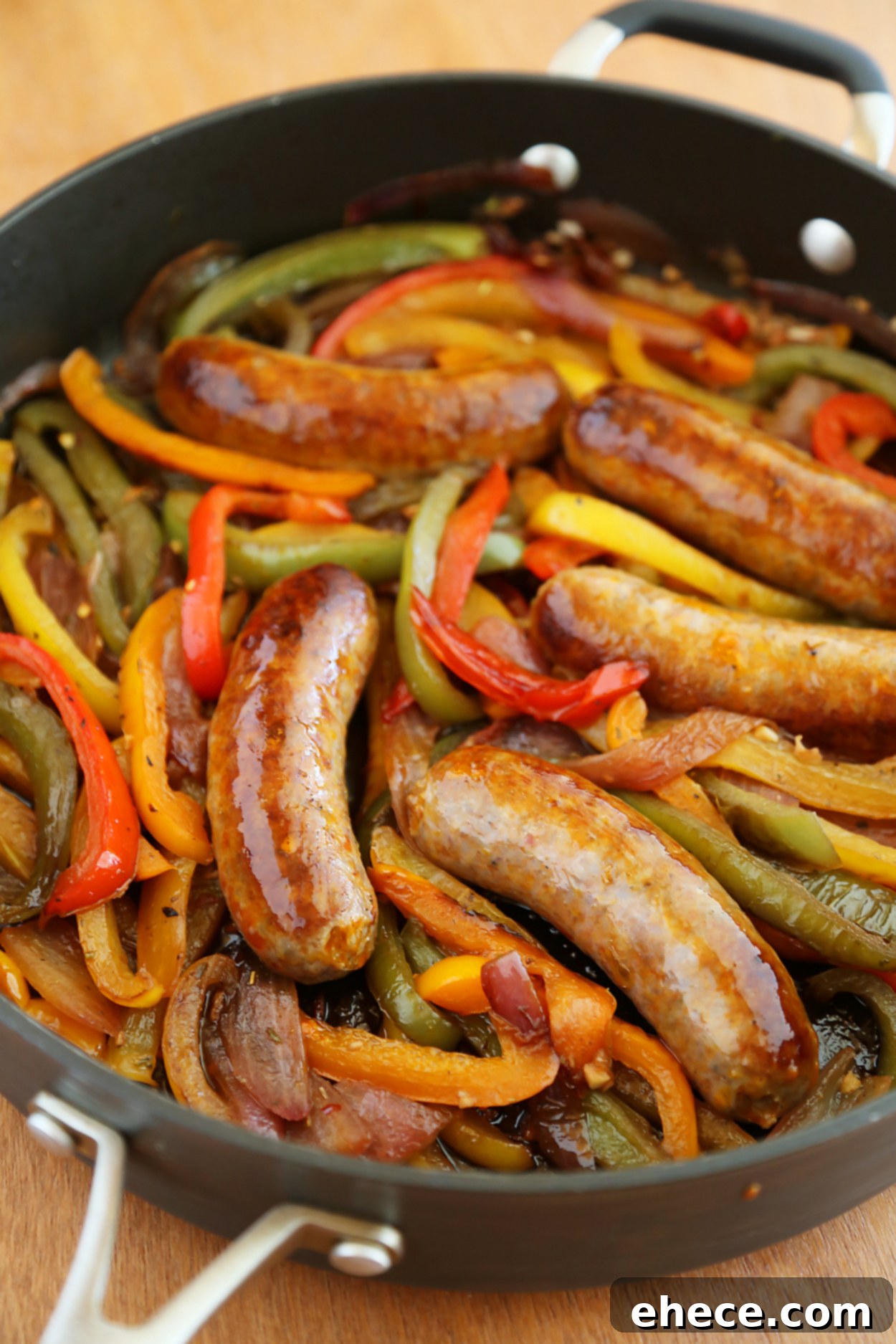 Rustic Skillet Sausage and Peppers 7 Skillet Italian Sausage, Peppers and Onions - Easy comfort food for weeknights & game days! Serve over pasta, polenta, potatoes or on warm crusty rolls.