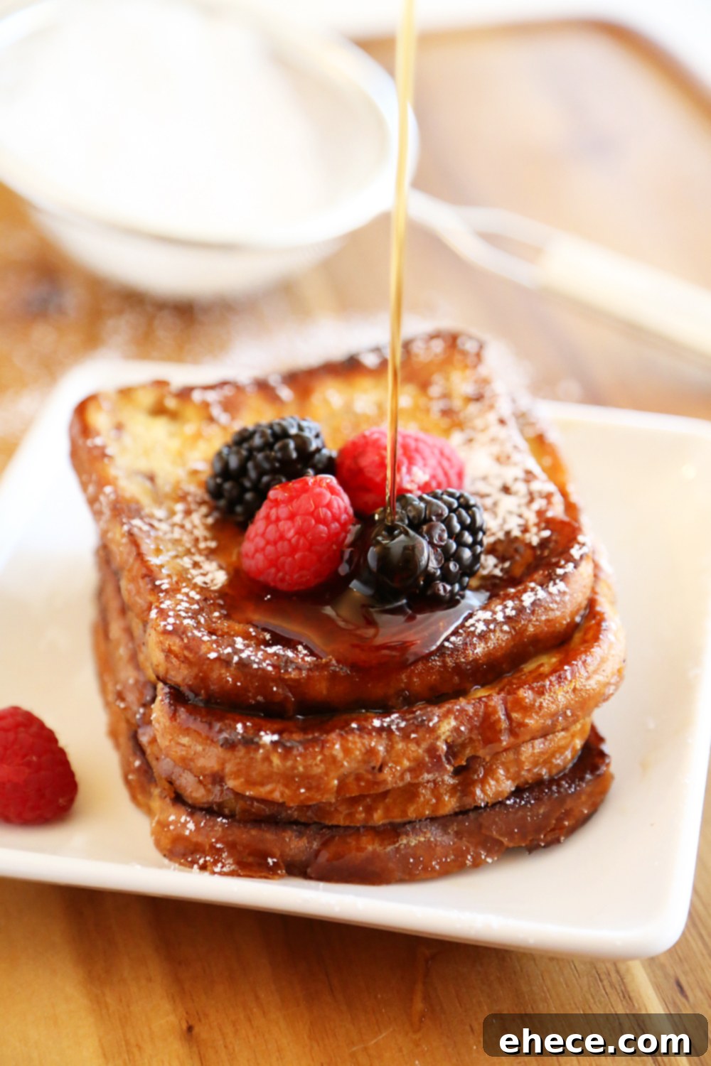 Close-up of golden brown Cinnamon Swirl French Toast, ready to be served. A quick and easy breakfast idea with amazing flavor.