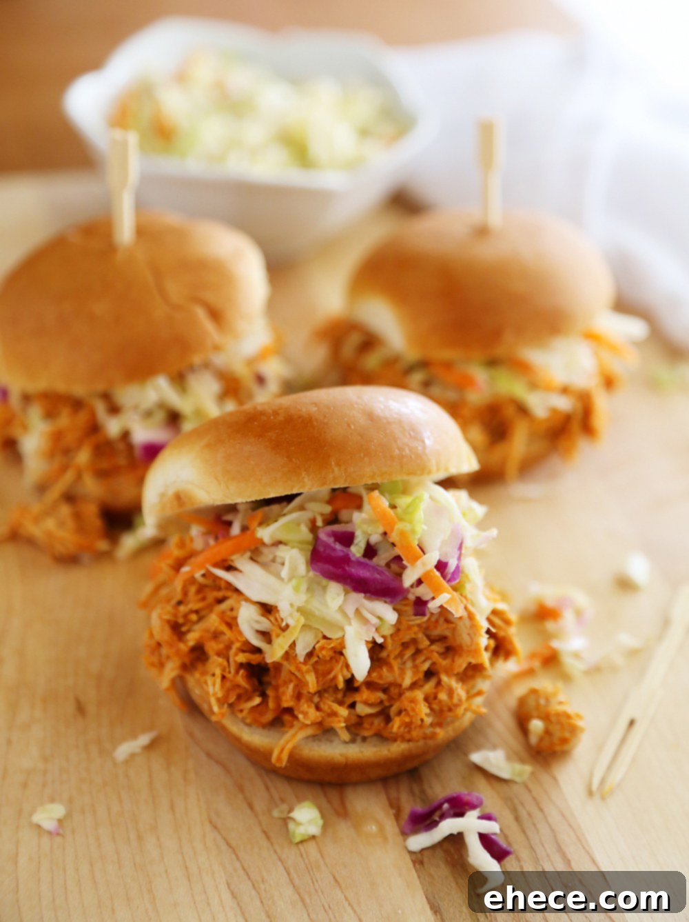 Tangy Slow Cooker Buffalo Chicken Sliders 2 Ultimate Slow Cooker Buffalo Chicken Sliders. Tender, tangy chicken piled high on toasted buns, perfect for any gathering or an easy dinner.