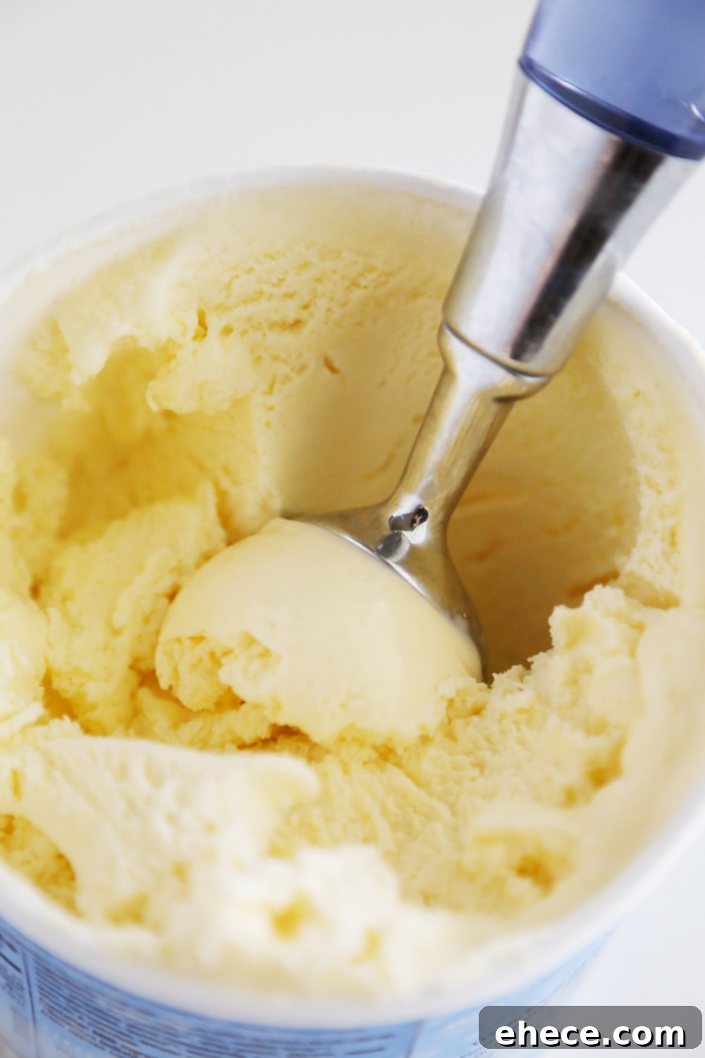 Mini Vanilla Wafer Ice Cream Sandwiches – The perfect quick + easy frozen treat! Roll in your favorite toppings and enjoy. thecomfortofcooking.com