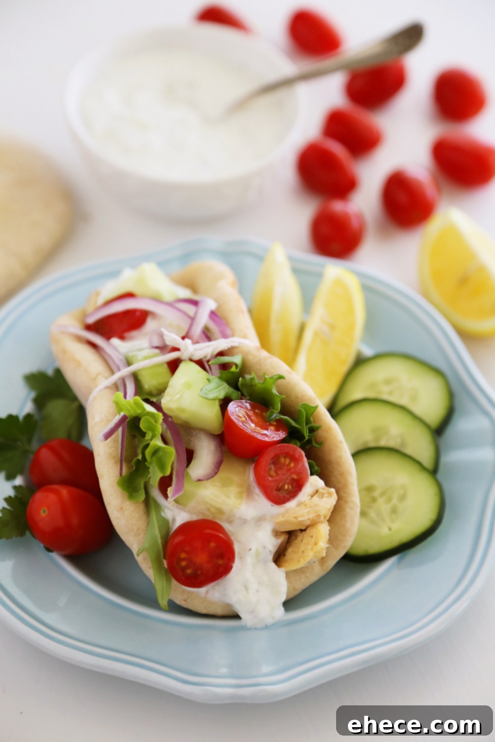 Slow Cooker Chicken Gyros with Tzatziki Sauce - Just like your favorite Greek takeout, but 10x more fresh and flavorful! Thecomfortofcooking.com