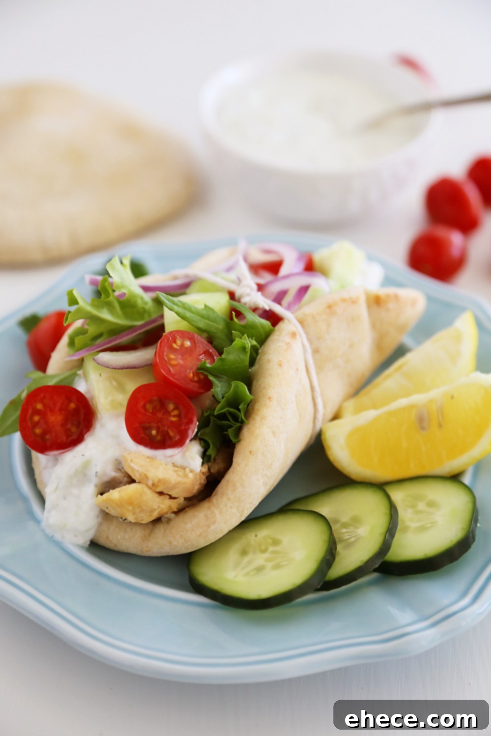 Slow Cooker Chicken Gyros with Tzatziki Sauce - Just like your favorite Greek takeout, but 10x more fresh and flavorful! Thecomfortofcooking.com