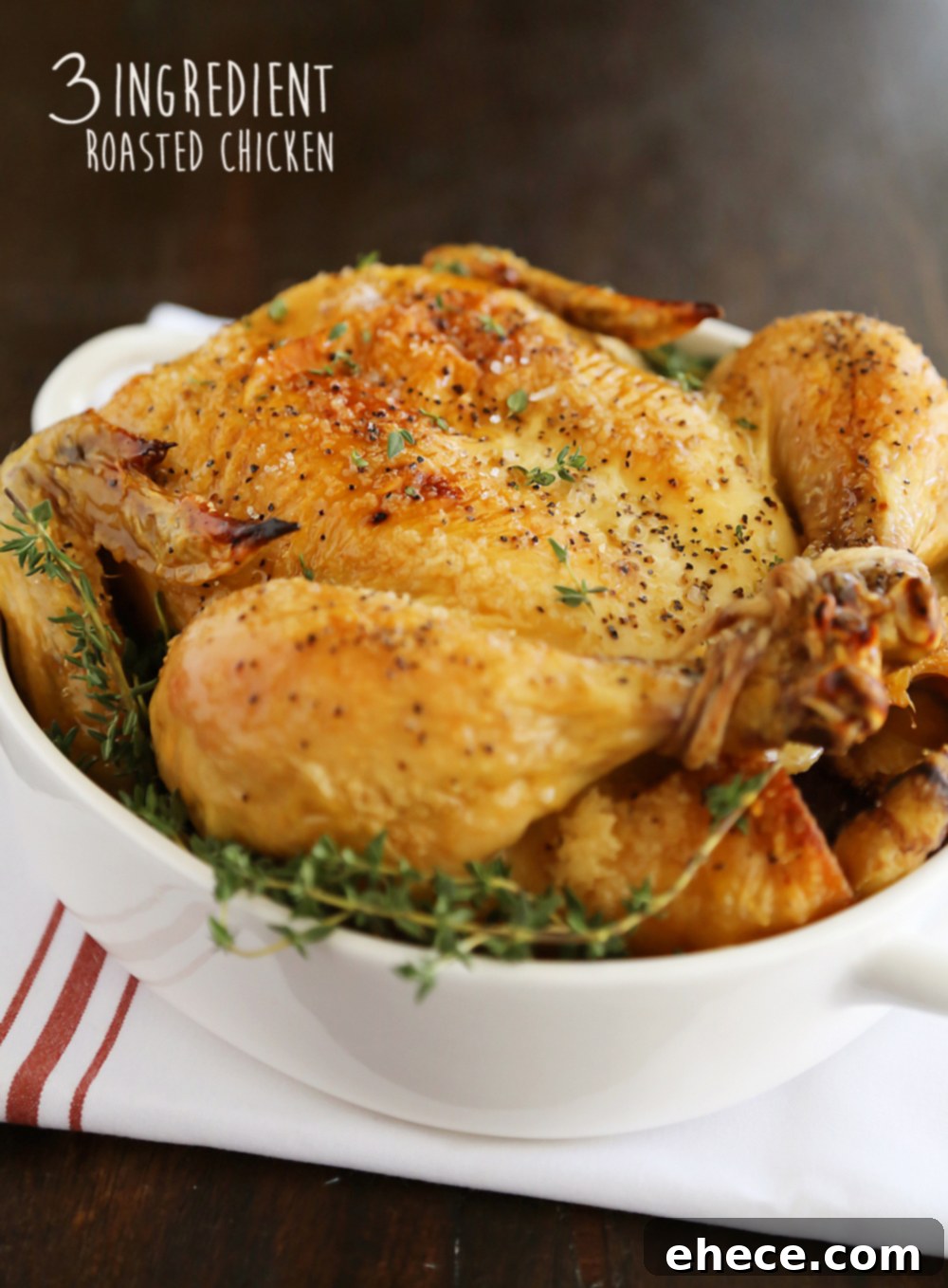 Close-up of a golden-brown roasted chicken, showcasing its crispy skin