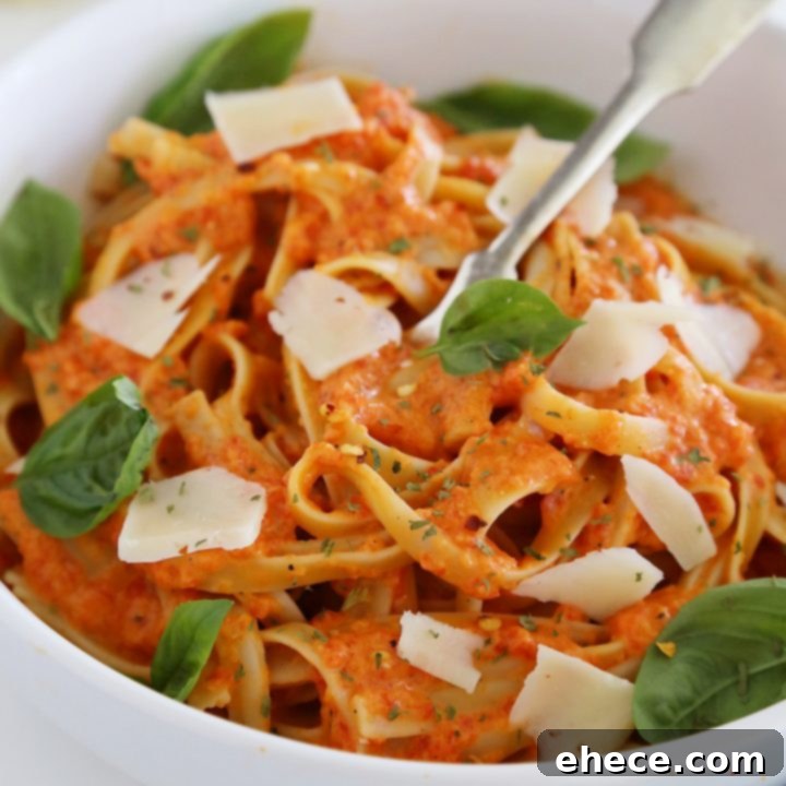 Velvety Roasted Red Pepper Pasta 8 Creamy Roasted Red Pepper Pasta - The completed dish, showcasing its vibrant color and inviting texture.