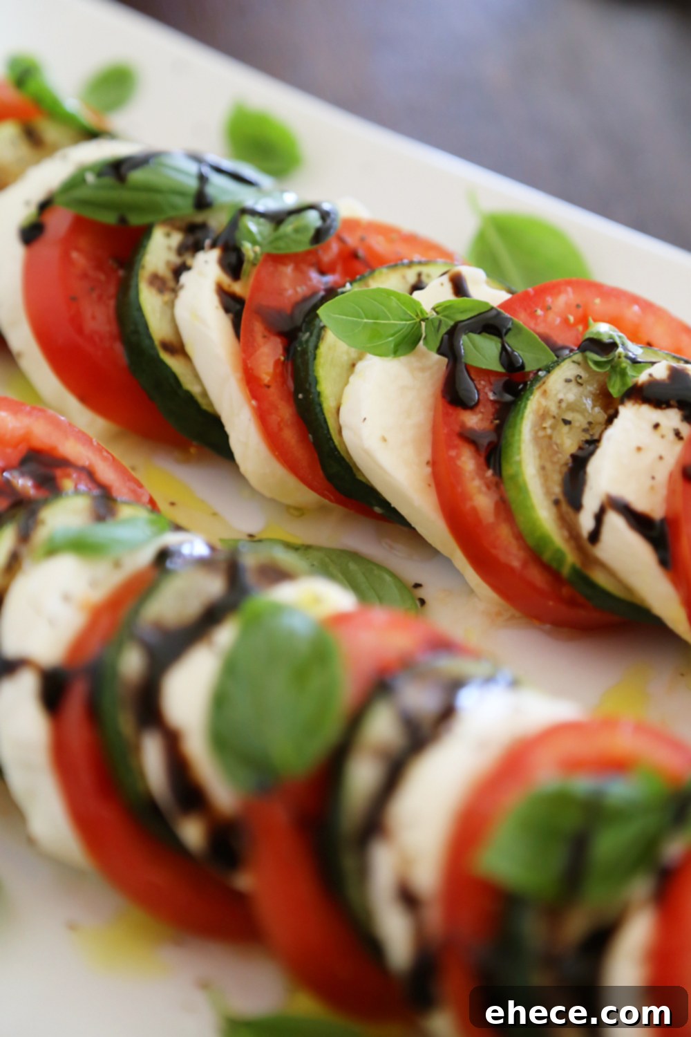Caprese Zucchini Grill 4 Grilled Zucchini Caprese Salad - Colorful, healthy, quick and easy. Serve alongside your favorite grilled meats and fish! Thecomfortofcooking.com