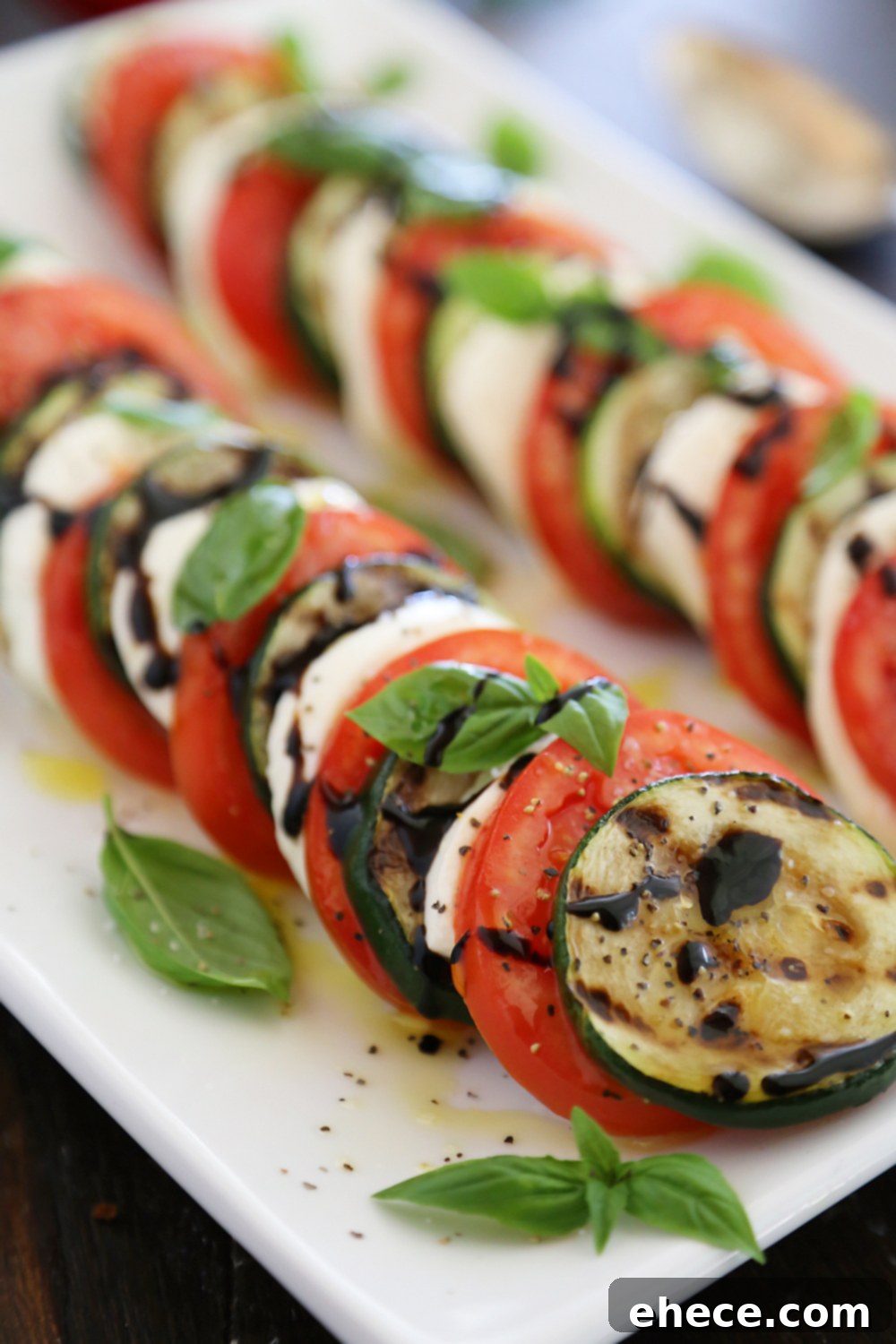 Caprese Zucchini Grill 5 Grilled Zucchini Caprese Salad - Colorful, healthy, quick and easy. Serve alongside your favorite grilled meats and fish! Thecomfortofcooking.com