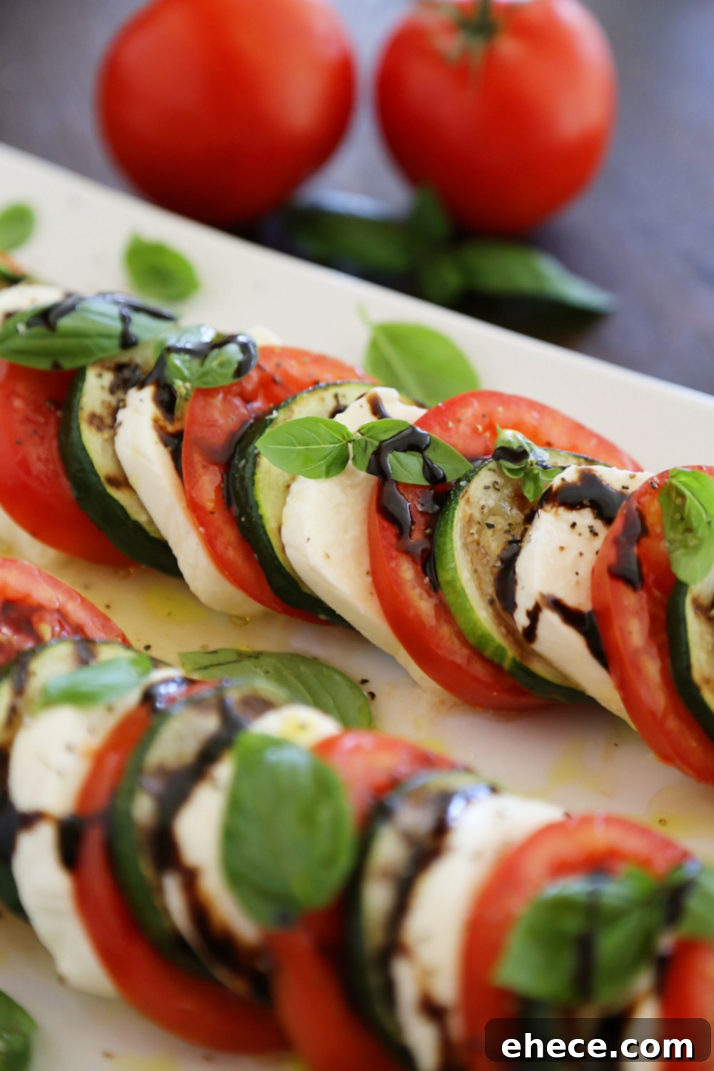 Caprese Zucchini Grill 6 Grilled Zucchini Caprese Salad - Colorful, healthy, quick and easy. Serve alongside your favorite grilled meats and fish! Thecomfortofcooking.com