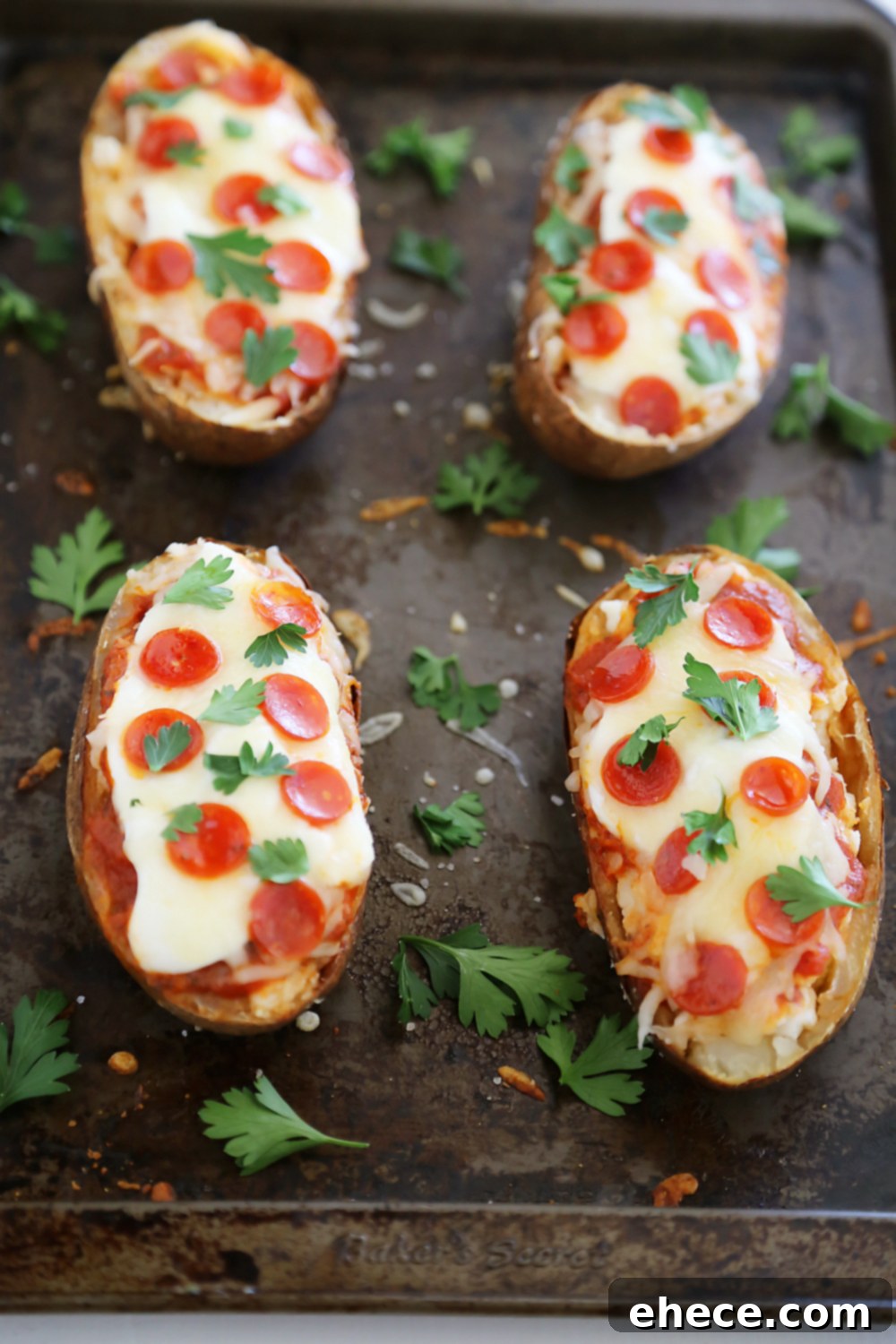 Ultimate Pizza Potato Boats 3 Pepperoni Pizza Potato Skins - Hearty, crispy potato skins meet cheesy pepperoni pizza! A perfect party appetizer. Thecomfortofcooking.com