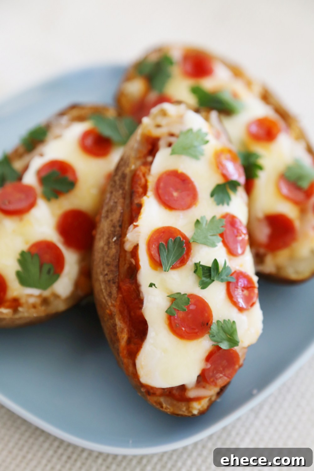 Ultimate Pizza Potato Boats 6 Pepperoni Pizza Potato Skins - Hearty, crispy potato skins meet cheesy pepperoni pizza! A perfect party appetizer. Thecomfortofcooking.com