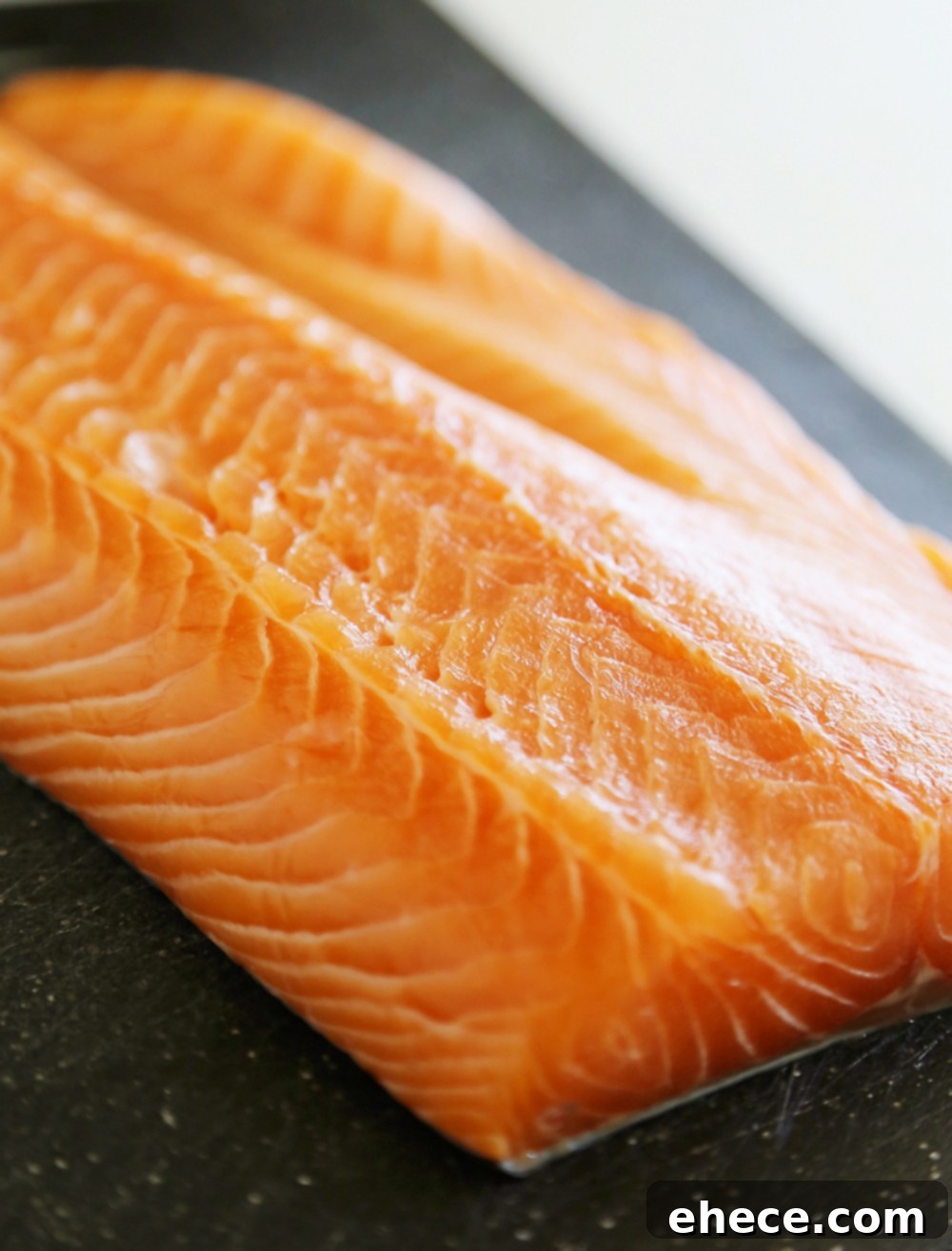 Honey-Soy Asian Salmon in Foil - Perfectly cooked, flaky salmon glazed with a sweet and savory sauce.